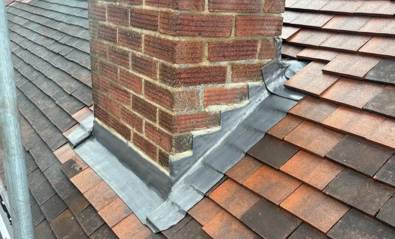 New lead flashing being fitted on a roof in High Wycombe