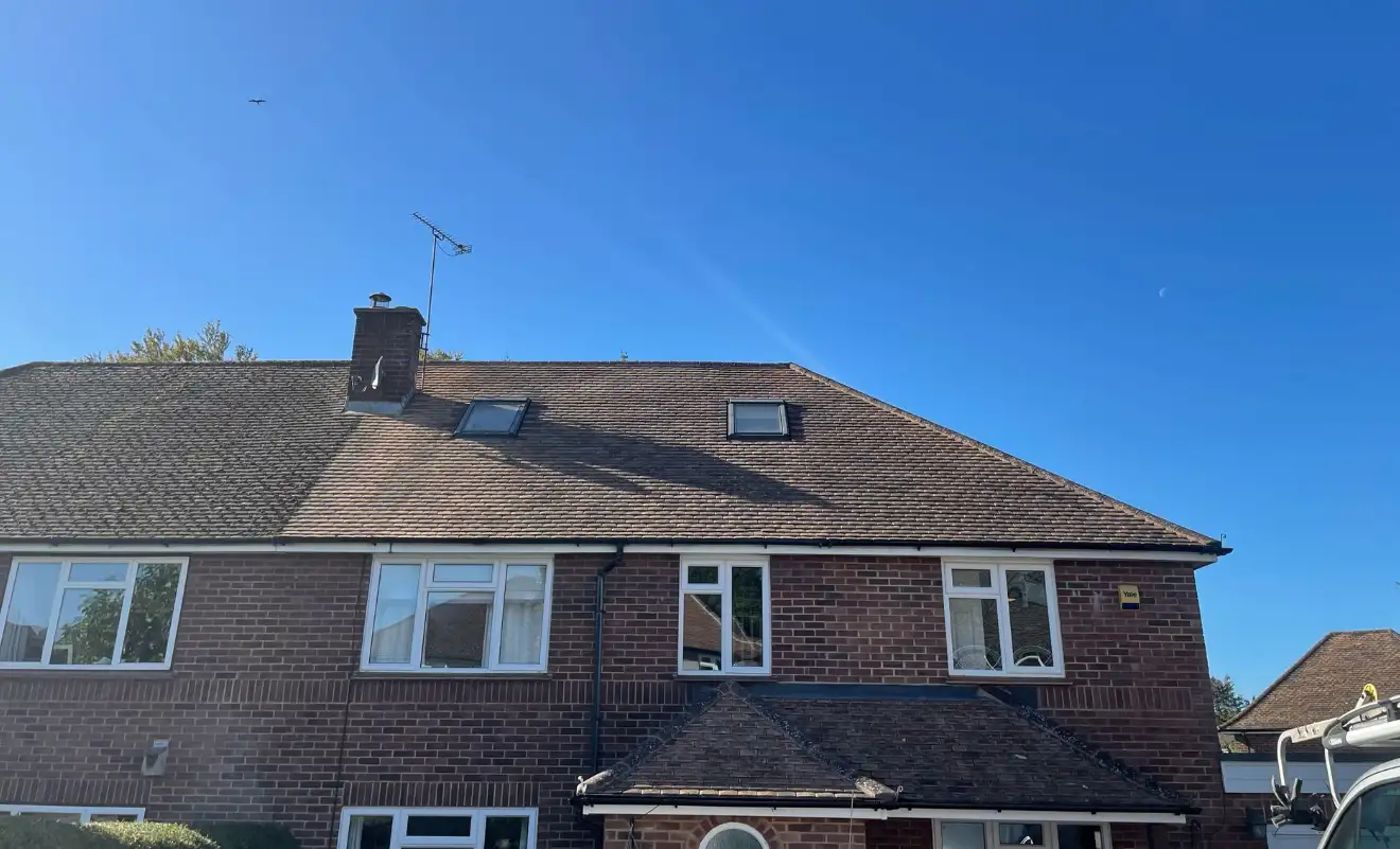 Roof covered with heavy moss before removal in Watford