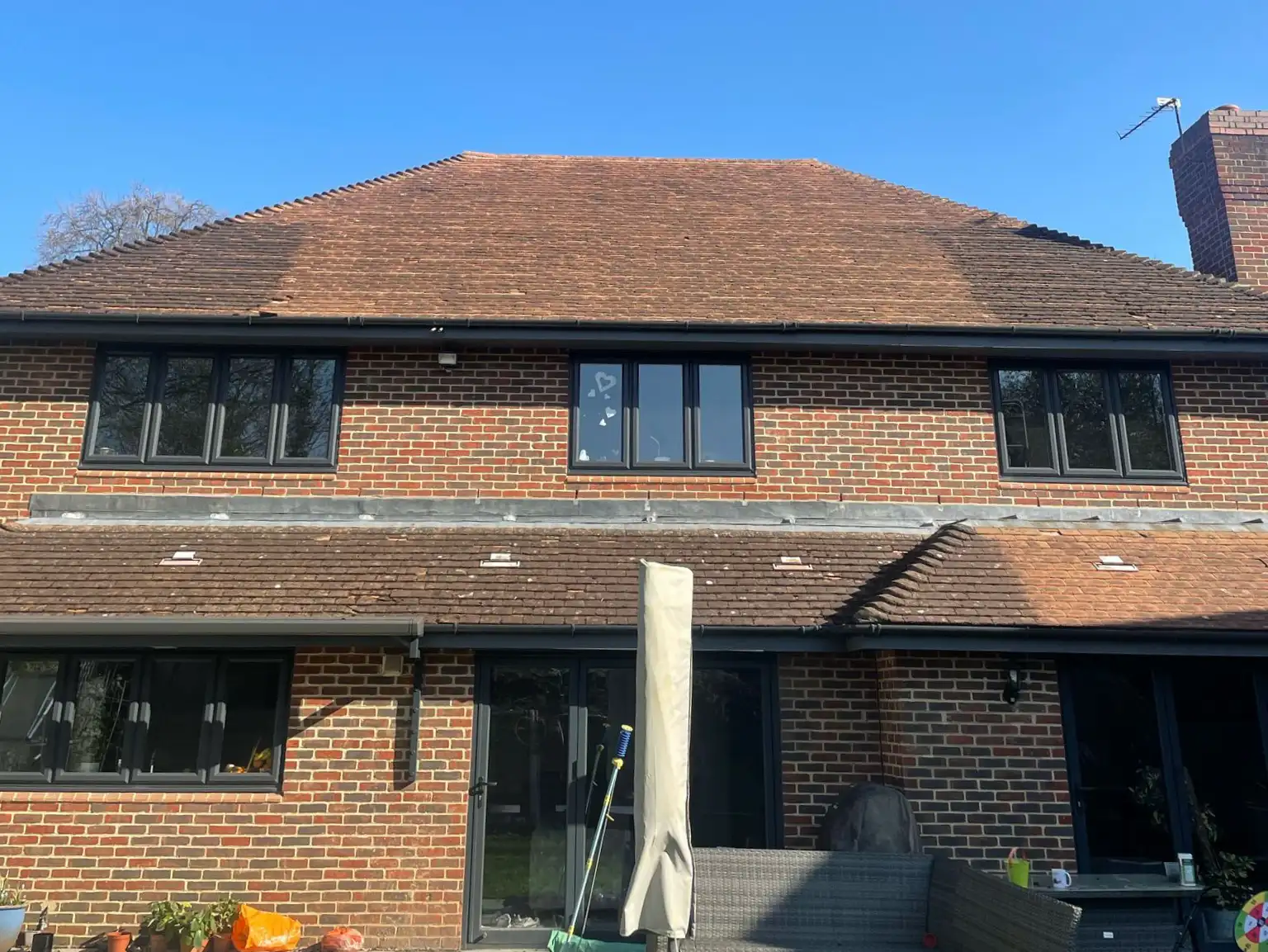 Roof moss removal by hand