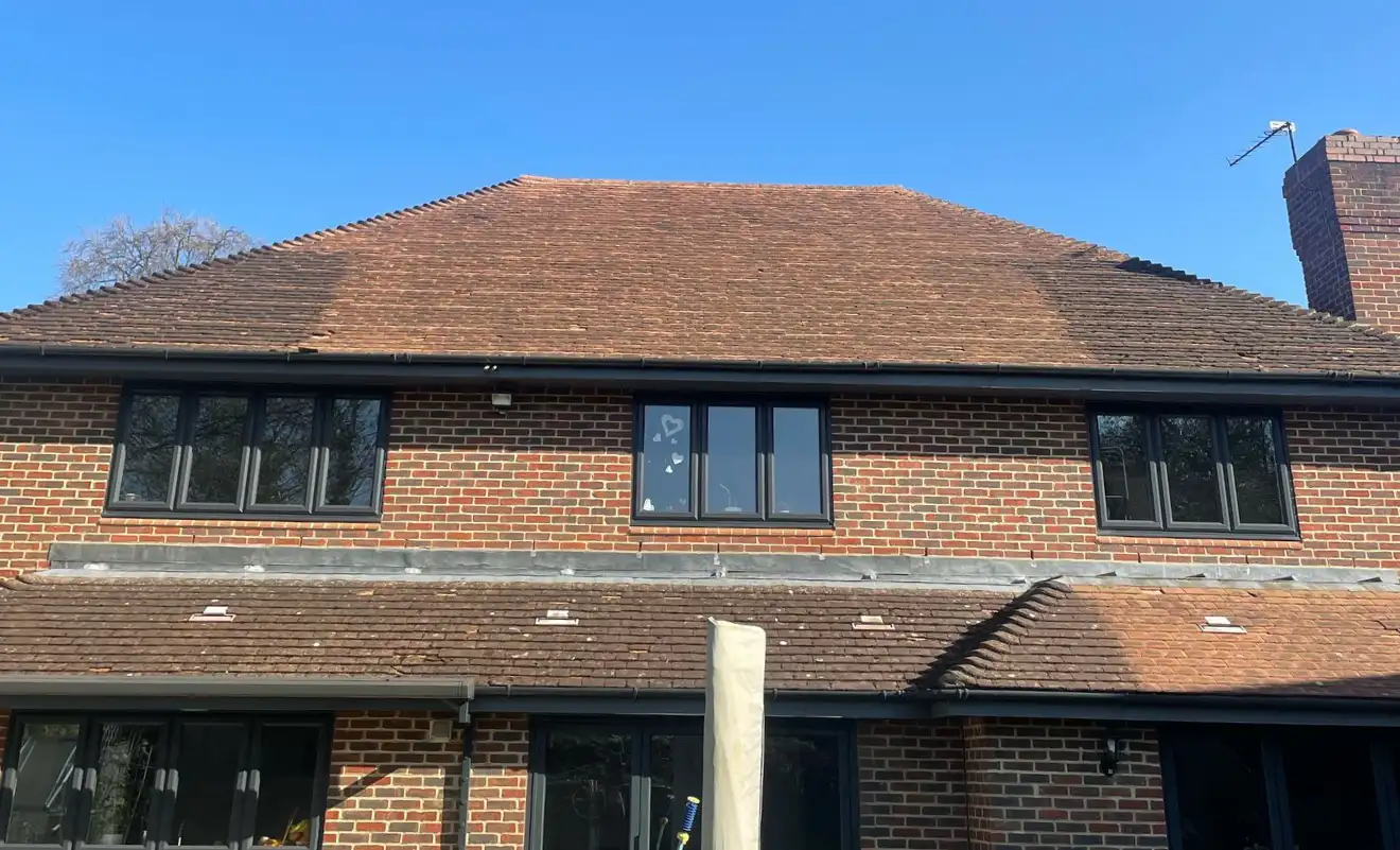 Roof cleaning in progress